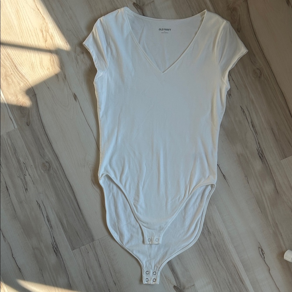 White V necked body suit